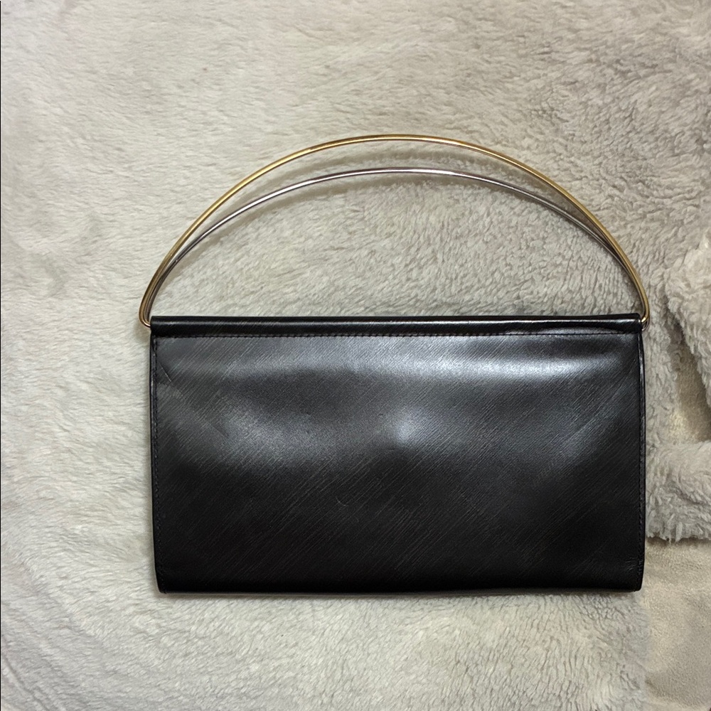 Cartier Trinity Black Leather Clutch with Two-Tone Metal Handle